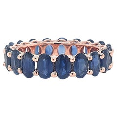 Anneau ovale en or 14 carats avec saphirs bleus