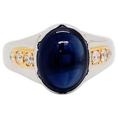 Blue Sapphire Oval Cabochon and White Diamond Cocktail Ring