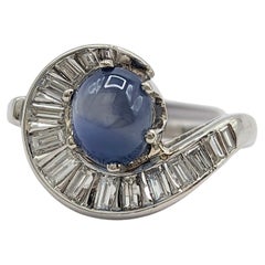 Blue Sapphire Oval Cabochon and White Diamond Ring in Platinum