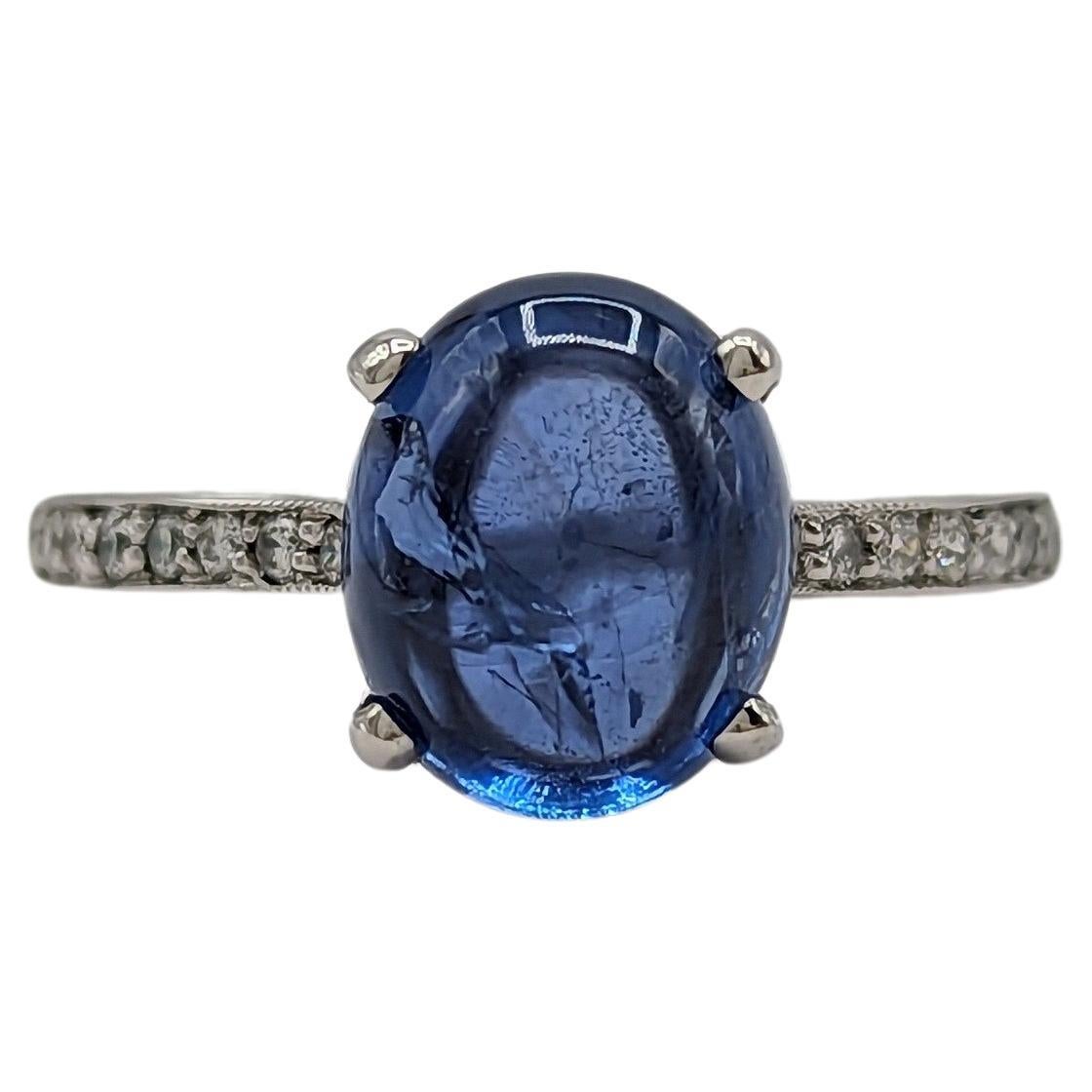 Blue Sapphire Oval Cabochon Solitaire Ring in 14K White Gold For Sale