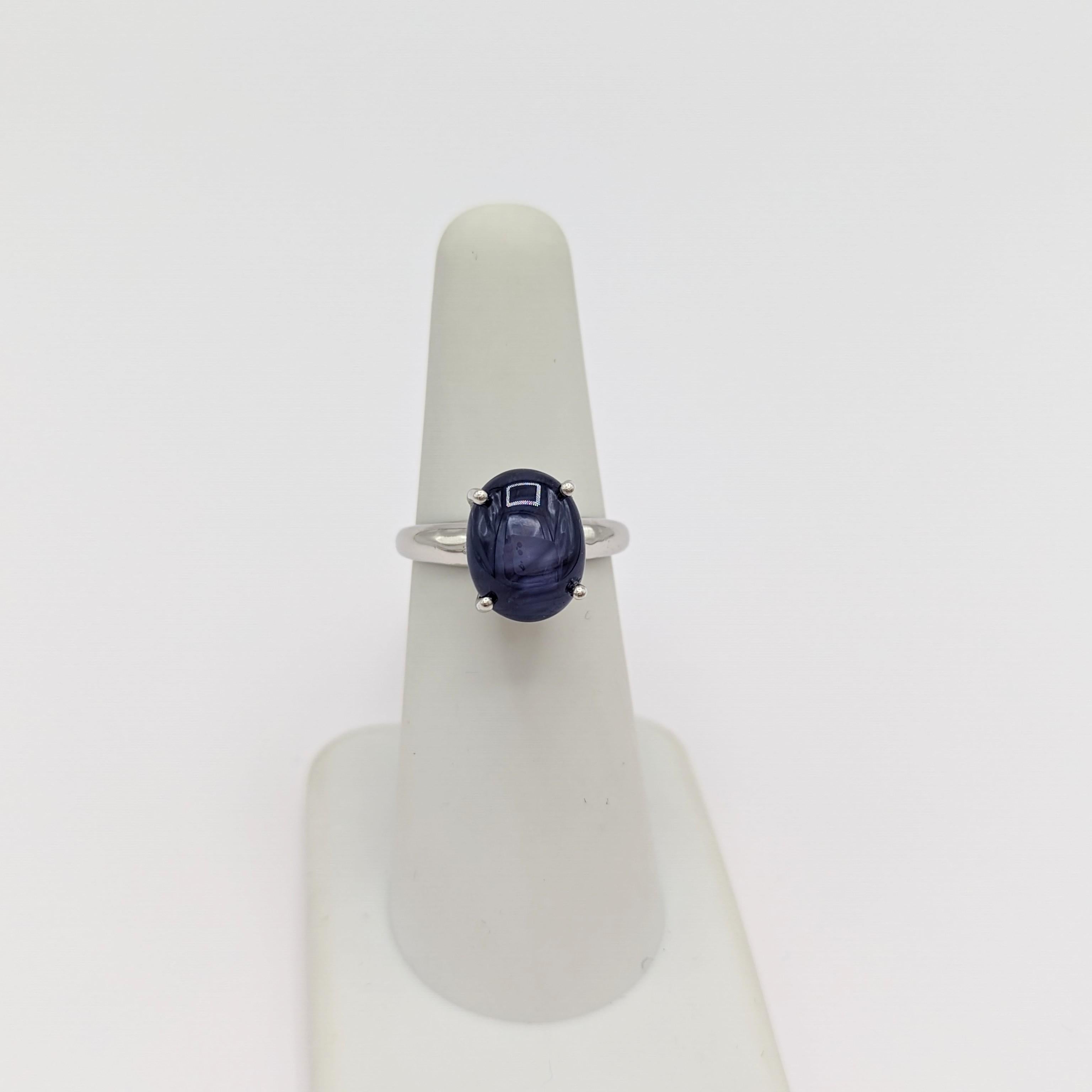 Women's or Men's Blue Sapphire Oval Cabochon Solitaire Ring in Platinum For Sale