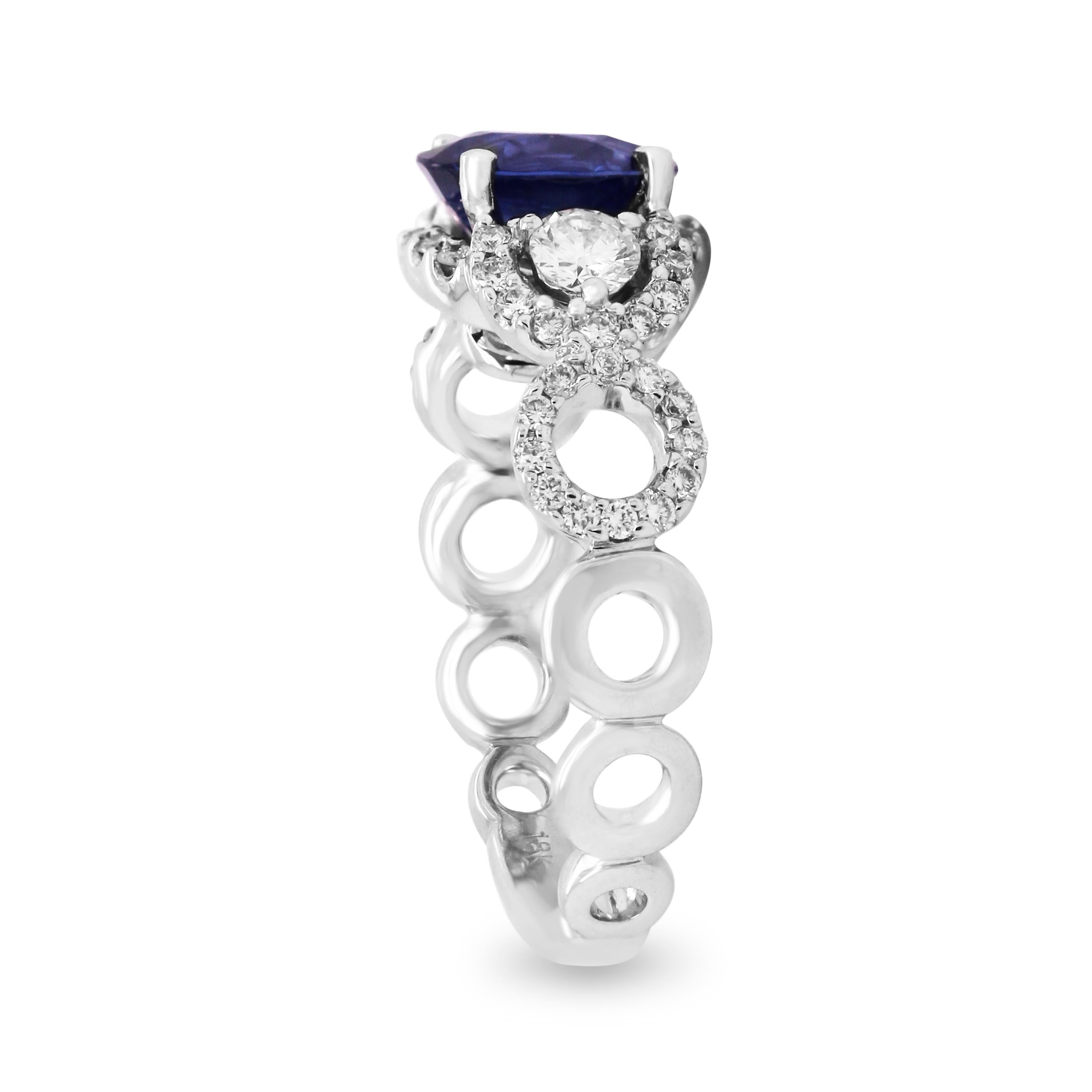 Contemporary Blue Sapphire Oval Cut and Diamond White Gold Cocktail Spiral Round Band Ring For Sale