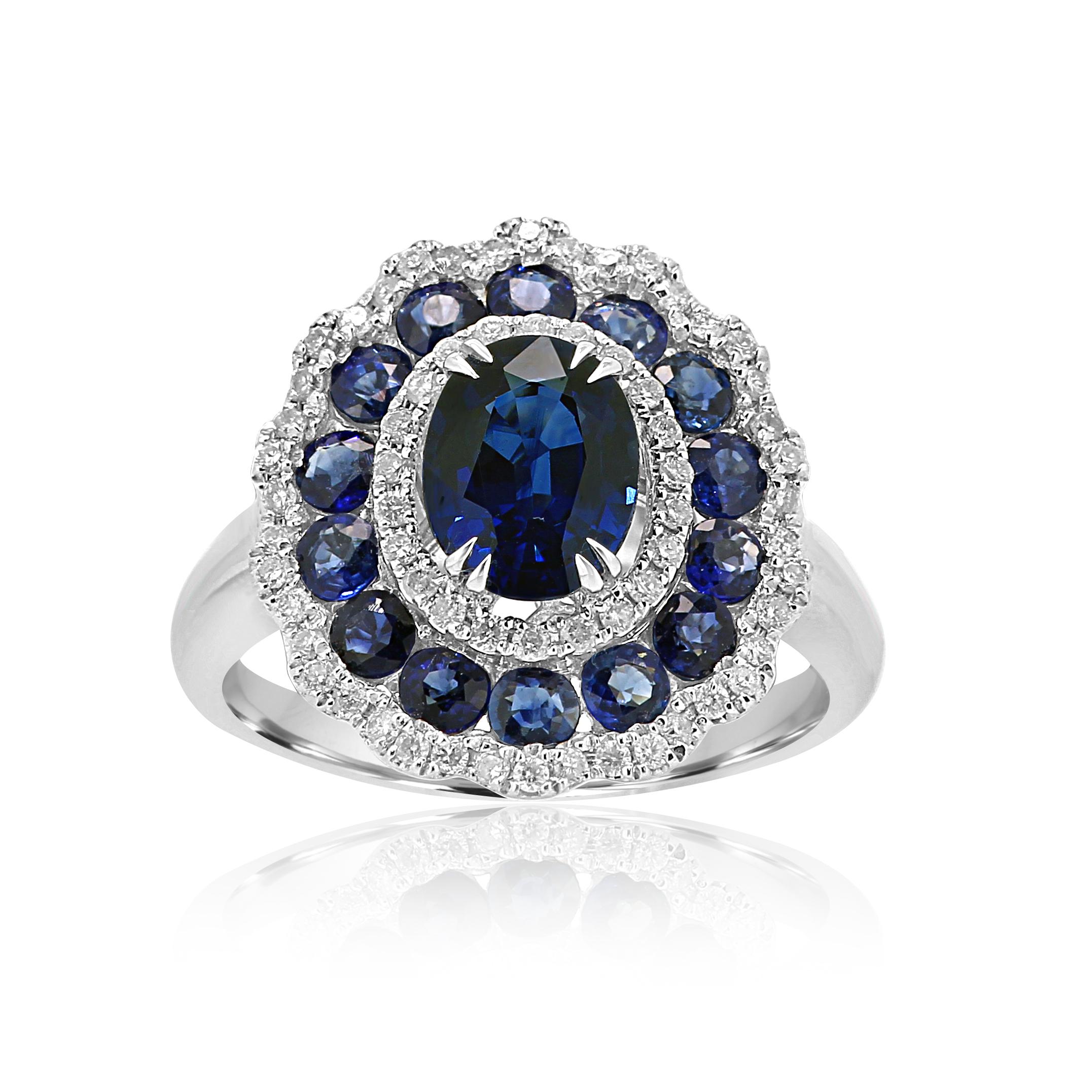 Blue Sapphire Oval 1.59 Carat encircled in Triple Halo of white diamond rounds 0.34 Carat and 15 Blue Sapphire Rounds 1.35 Carat in Stunning 18K White Gold Bridal Fashion Ring. 

Style available in different price ranges. Prices are based on your