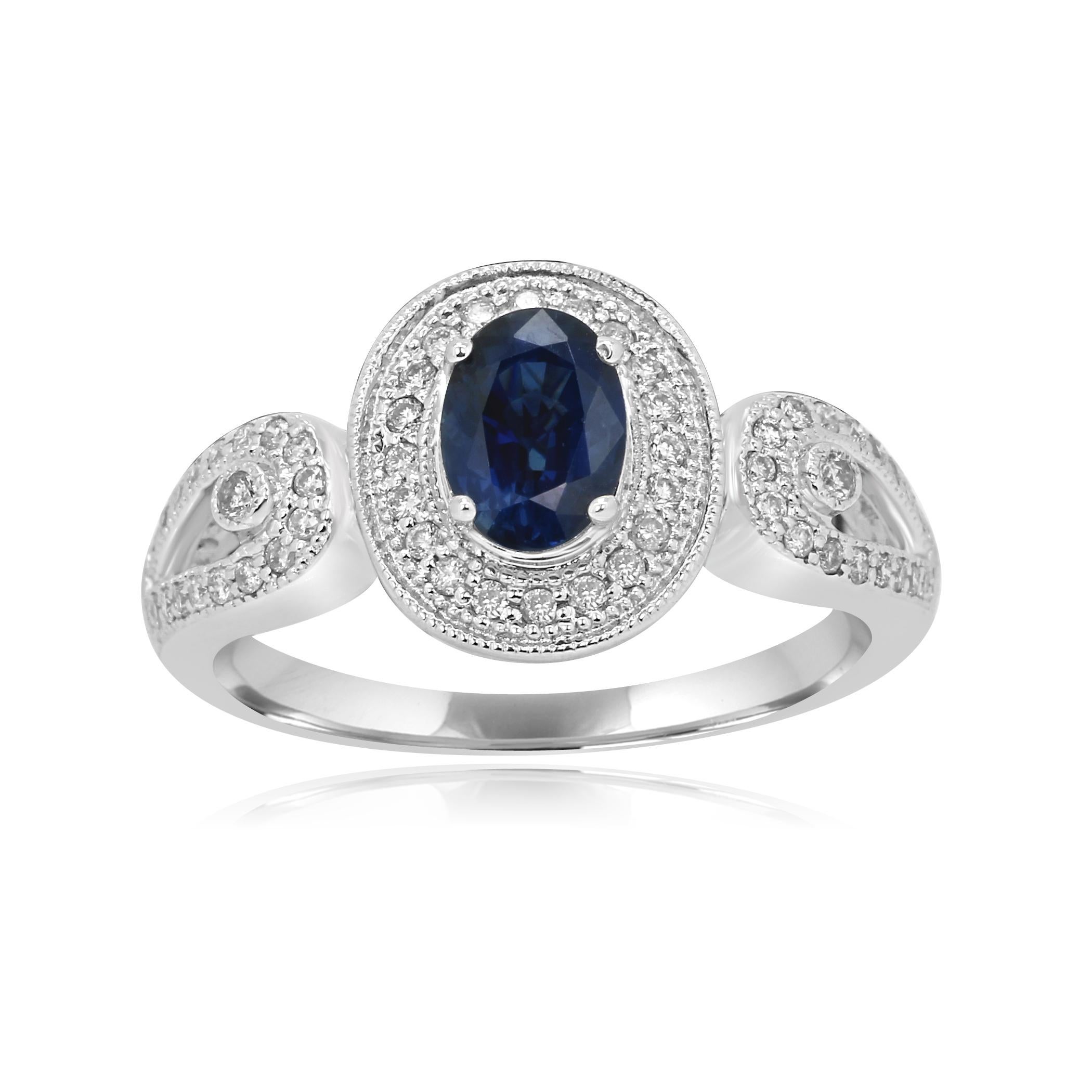 Blue Sapphire oval 1.01 Carat encircled in a single Halo of Round Brilliant Colorless SI Diamond 0.23 Carat. In a stunning 18K White Gold Fashion as well as bridal ring.

Style available in different price ranges. Prices are based on your selection