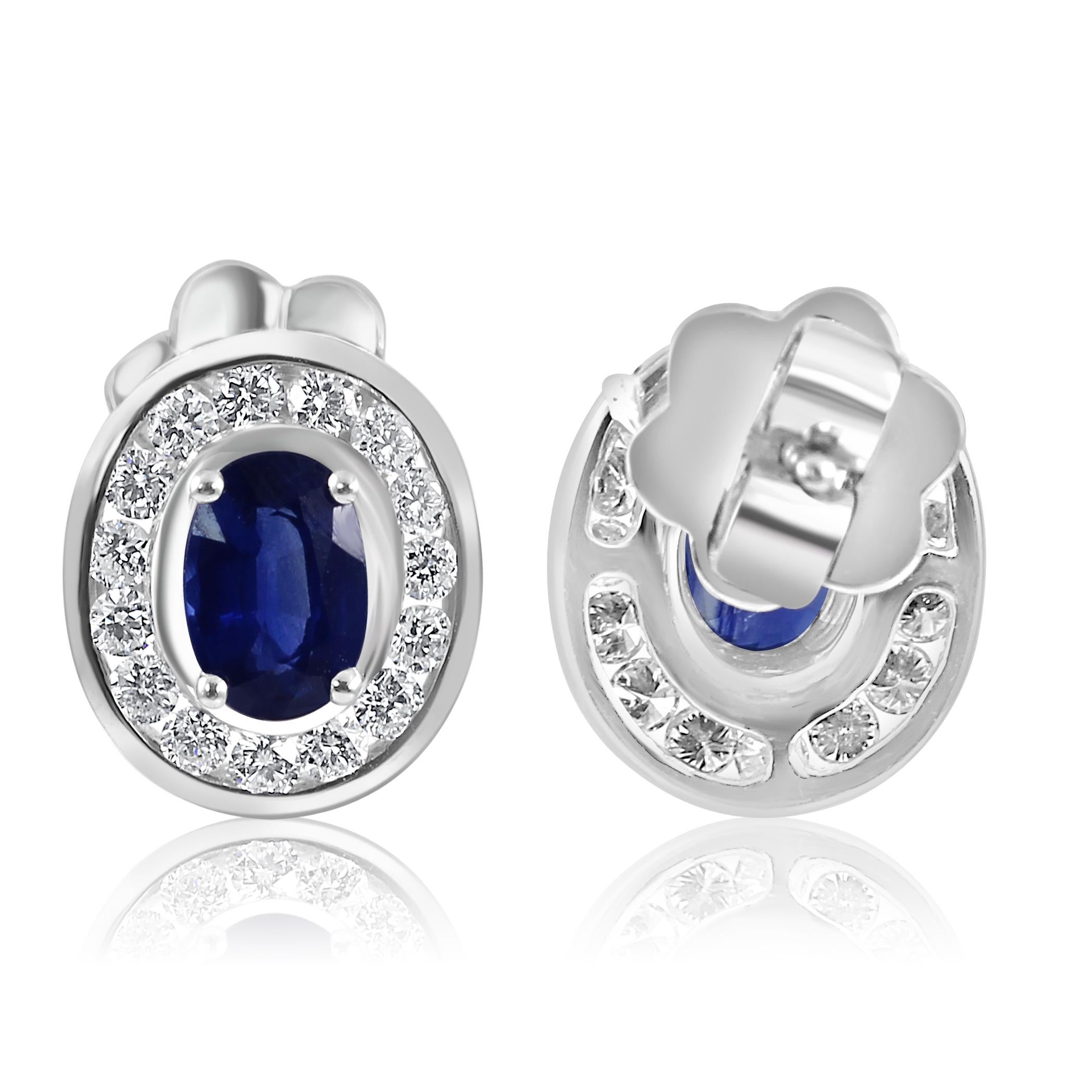 This exquisite pair of earrings redefines luxury, combining the timeless allure of blue sapphires with the brilliance of white diamonds in a design that exudes opulence and grace.

The focal point of each earring is the captivating blue sapphire