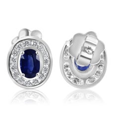 Blue Sapphire Oval White Diamond Round Halo 18 Karat Gold Fashion Stud Earring