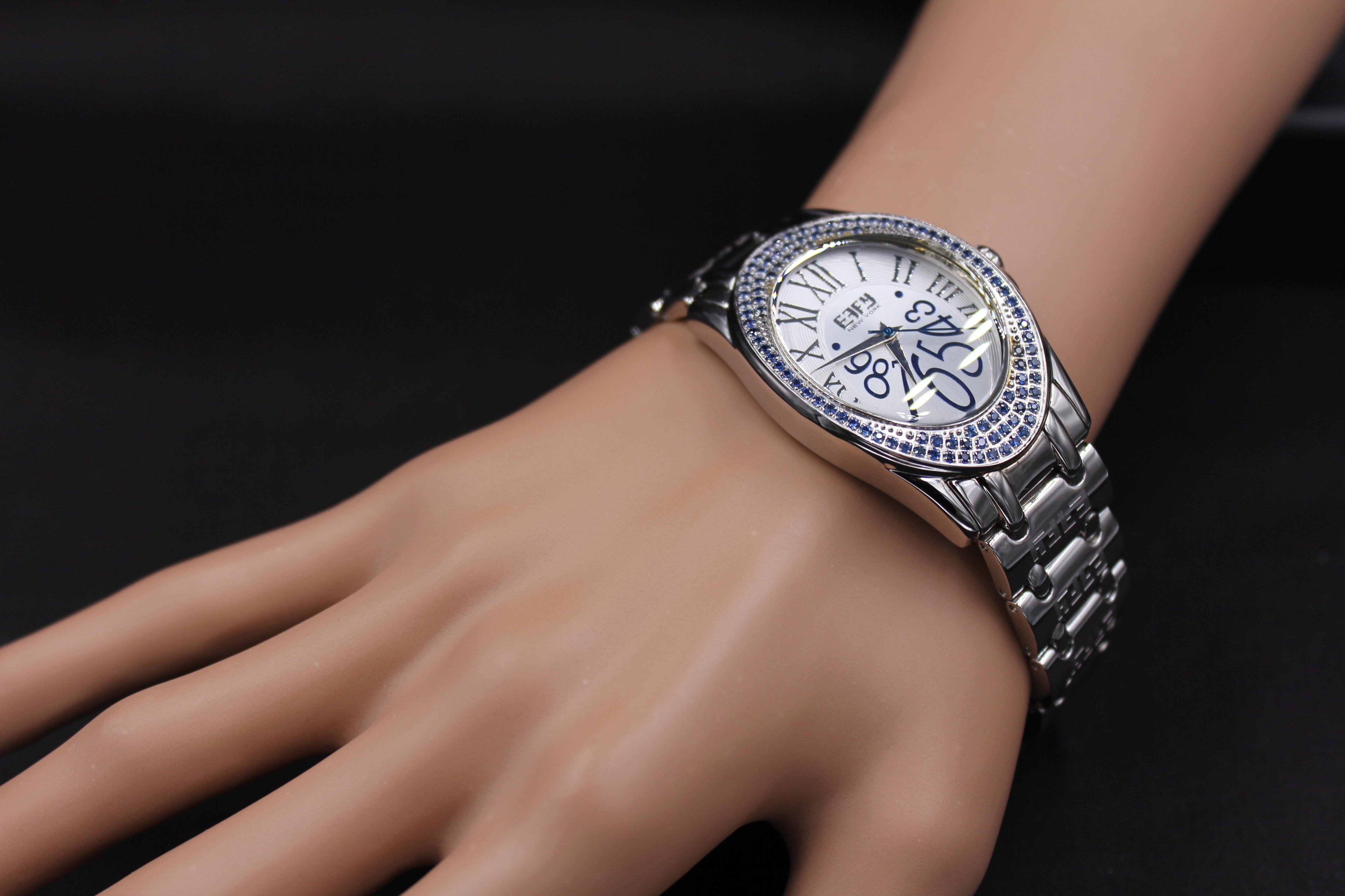 · ·         Quality Swiss-Quartz movement guarantees precision timing
·         Mother-of-Pearl dial micro-paved with diamonds and gemstones enhances any dress style
·         Scratch-resistant sapphire glass lens
·         Stainless steel bracelet