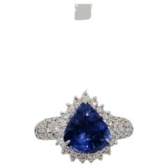 Cocktailring aus Platin mit blauem blauem Saphir in Birnenform und Diamant