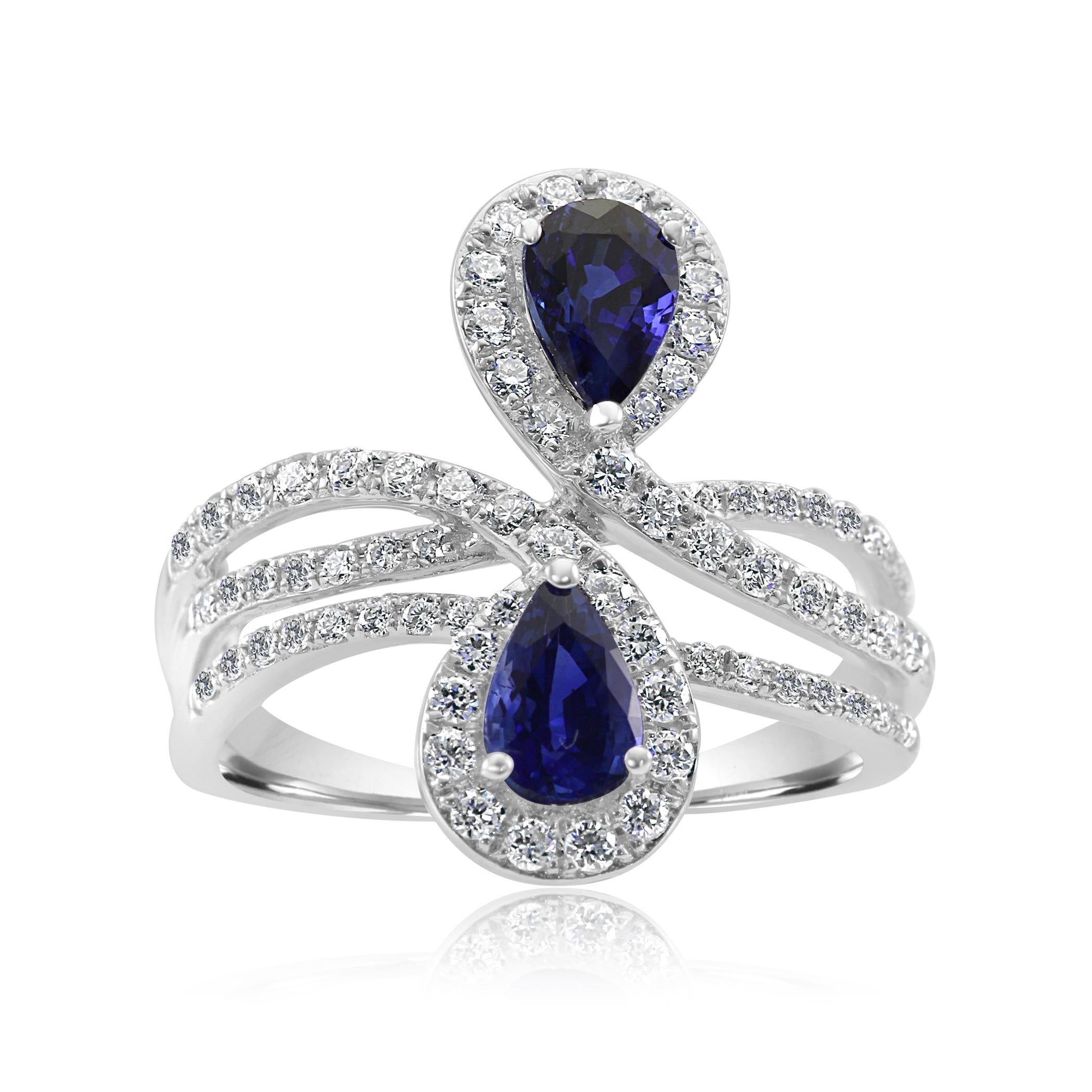 2 Stunning Blue Sapphire Pear 1.16 Carats encircled in single Halo of 73 White Colorless SI Clarity Diamond Rounds 0.59 Carat set in Gorgeous 14K White Gold Fashion Cocktail Toi Moi Ring.

Total Stone Weight 1.75 Carat

Style available in different