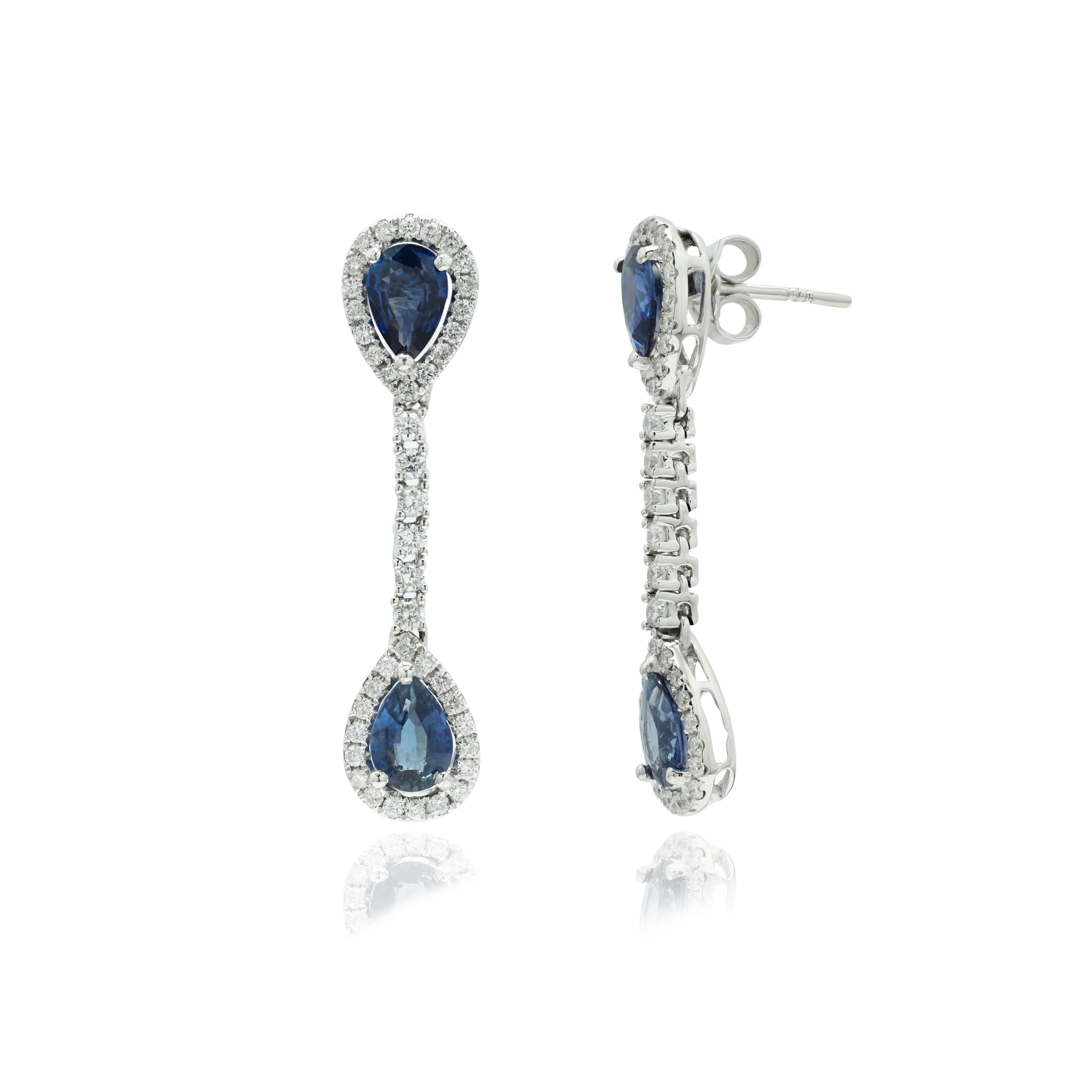 Blue Sapphire and Diamond Dangle Earrings to make a statement with your look. These earrings create a sparkling, luxurious look featuring pear cut gemstone.
If you love to gravitate towards unique styles, this piece of jewelry is perfect for