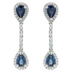 Blue Sapphire Pear Drop Dangle Earrings Studded with Diamonds in 14K White Gold