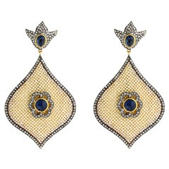 Boucles d'oreilles en saphir bleu, perle et diamant