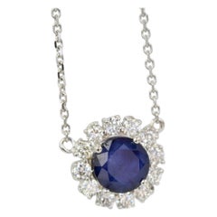 Blue Sapphire Pendant Necklace with Diamond Surround