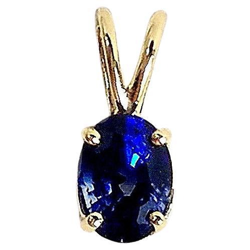 Ciondolo con zaffiro blu incastonato in oro 14K
