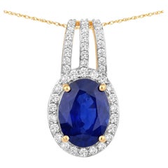 Pendentif en saphir bleu serti de diamants, 4,02 carats, or jaune 18 carats