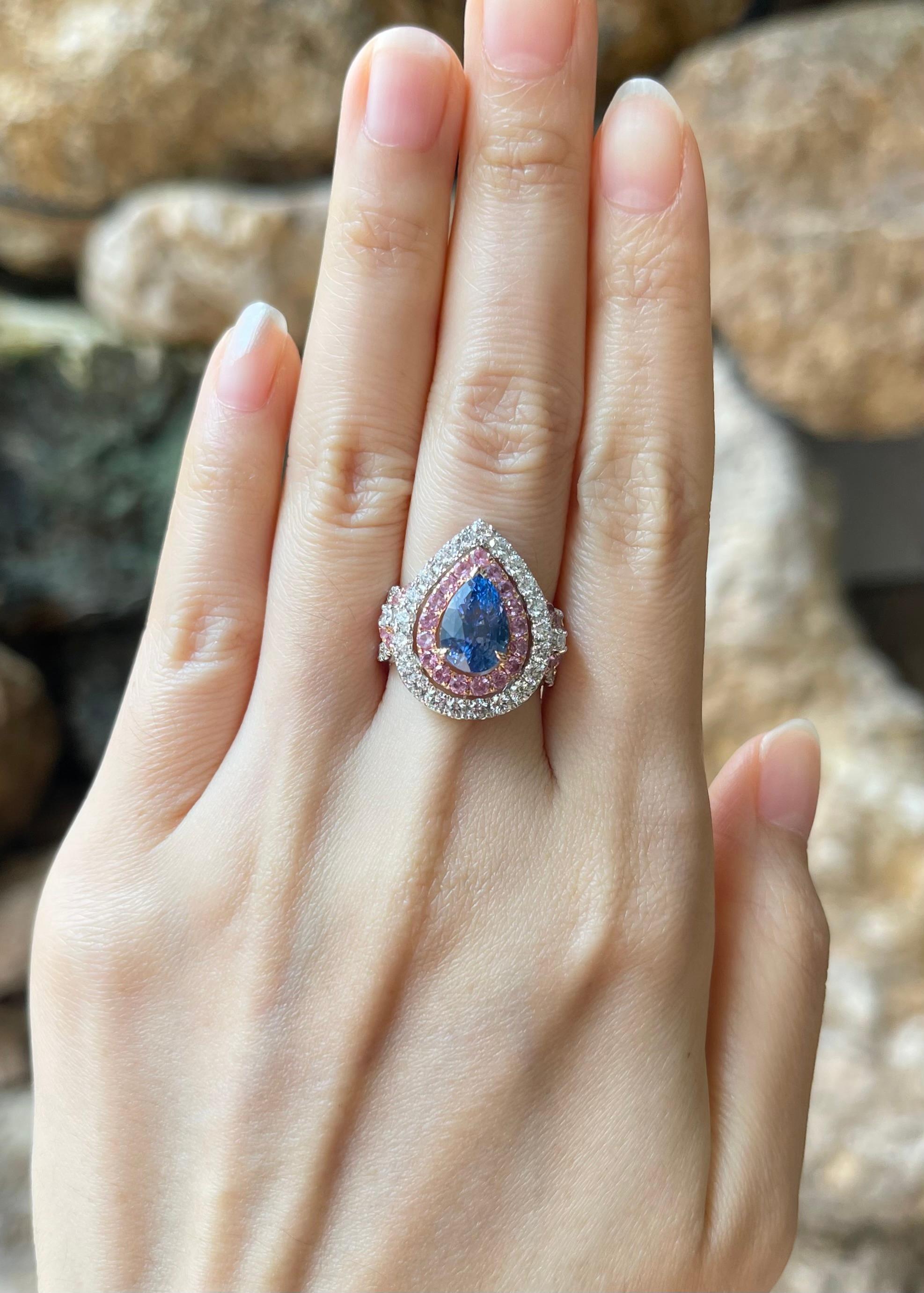 Blue Sapphire 3.70 carats, Pink Sapphire 0.98 carats and Diamond 1.20 carats Ring set in 18K Rose/ White Gold Settings

Width:  1.9 cm 
Length: 2.1 cm
Ring Size: 53
Total Weight: 8.21 grams

