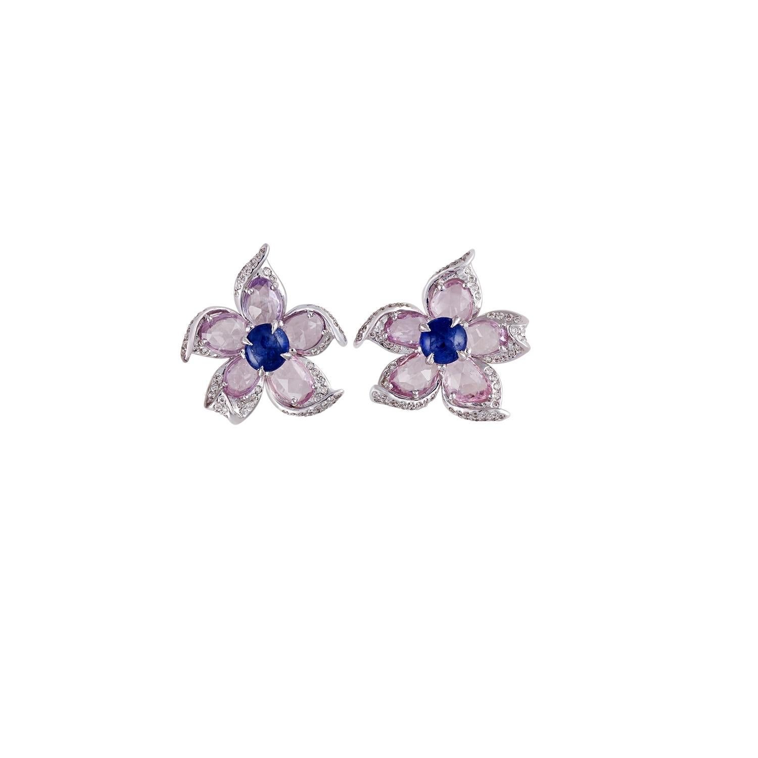 These are an exclusive pair of designer earrings features 2 pieces of cabochon shaped blue sapphires weight 1.77 carats, 10 pieces of rose cut pink sapphires weight 5.39 carats with round shaped diamonds weight 0.46 carat, this earring pair entirely