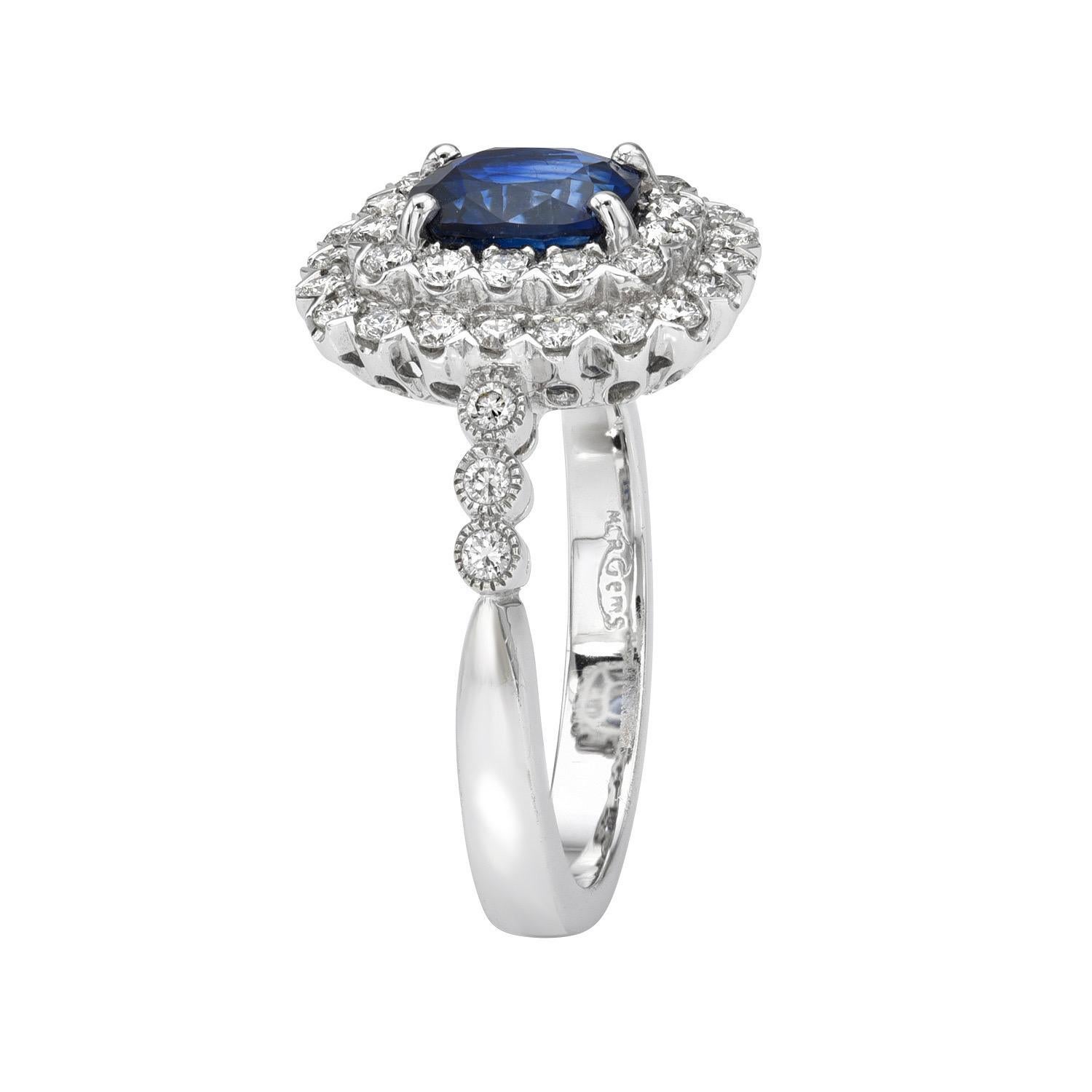 1.34 carat Royal Blue Sapphire cushion 18K white gold ring, decorated with round brilliant diamonds totaling 0.42 carats.
Ring size 6.5. Resizing is complementary upon request.
Returns are accepted and paid by us within 7 days of delivery.