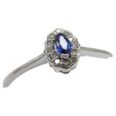 Blue Sapphire  Ring 14 Karat White Gold with Diamonds.