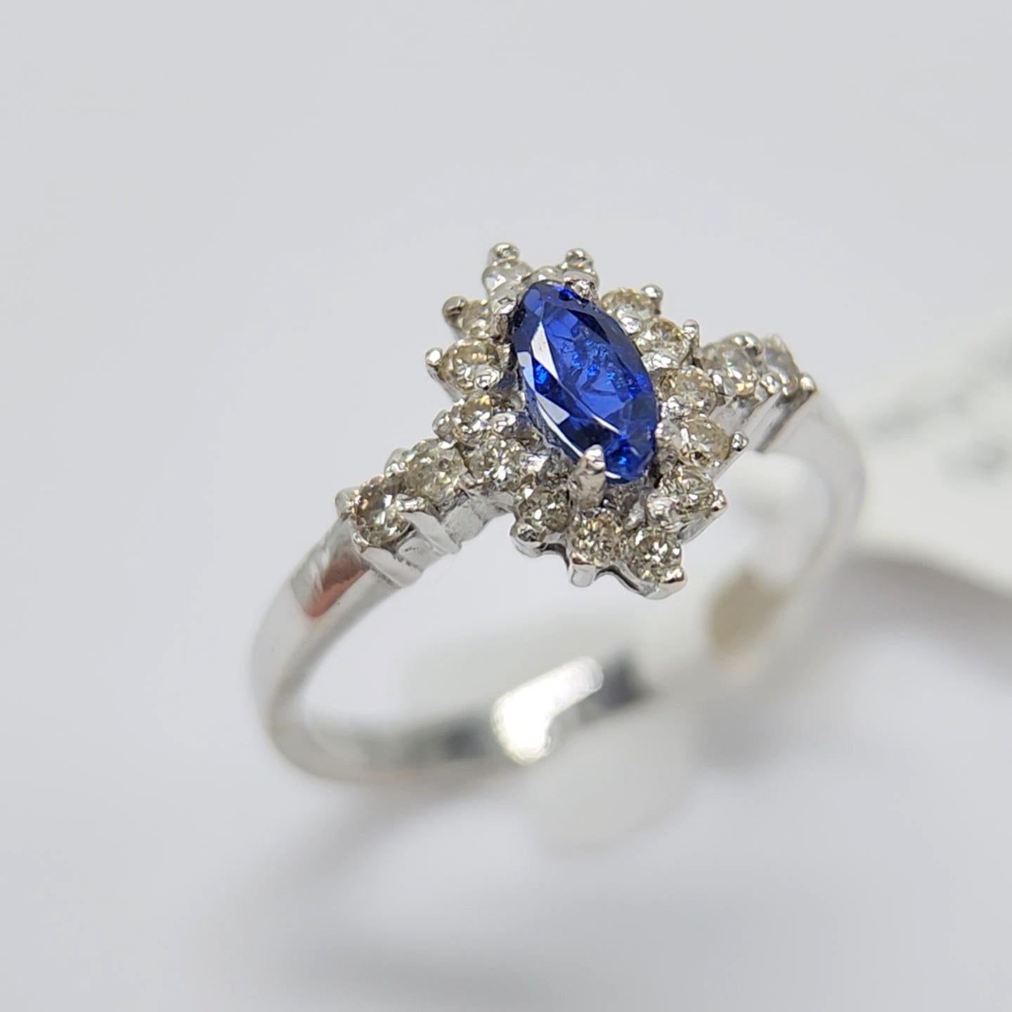 Marquis Shape Sapphire  AAA brilliant deep Blue color 0.30 carat.
Total diamonds 0.20 carat I J - SI
14k White Gold 2.65 Grams, 
Finger Size 7
All stones are natural and none treated.