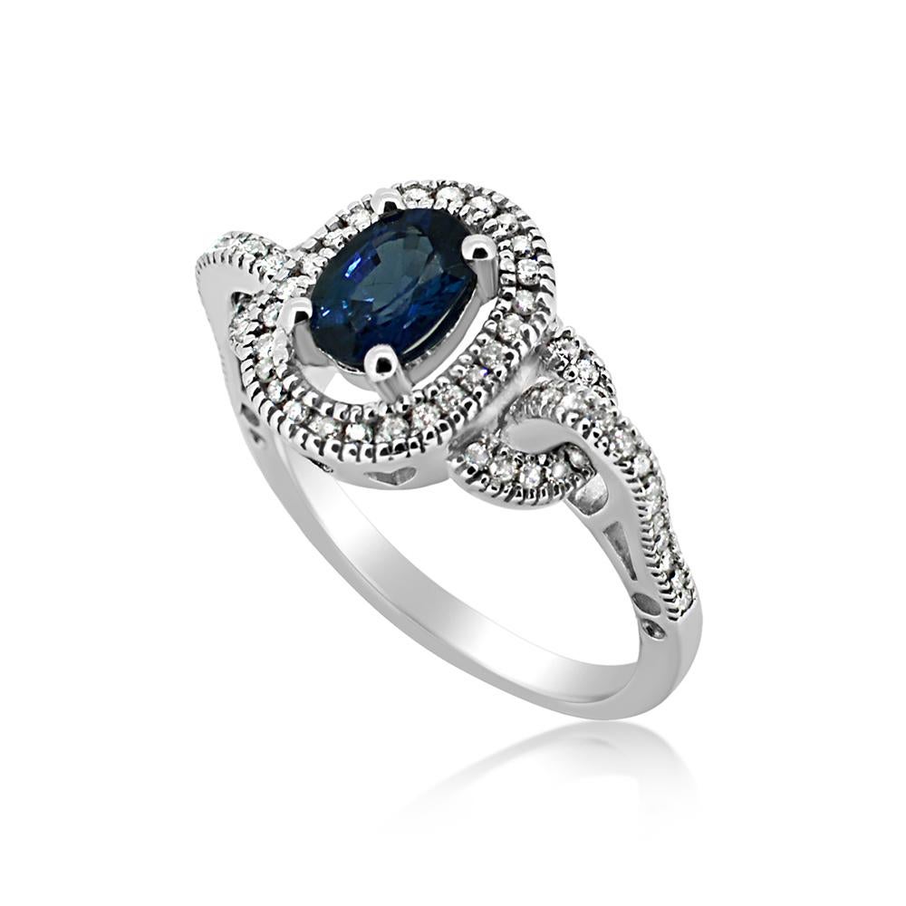 Oval Shape Sapphire  AAA brilliant deep Blue color 1.05 carat.
Total diamonds 0.50 carat G H - VS
14k White Gold 5.00 Grams, 
Finger Size 7.5
All stones are natural .