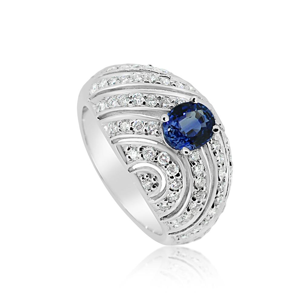 Oval Shape Sapphire  AAA brilliant deep Blue color 1.04 carat.
Total diamonds 1.00 carat G H - VVS
14k White Gold 7.50 Grams, 
Finger Size 7
All stones are natural .