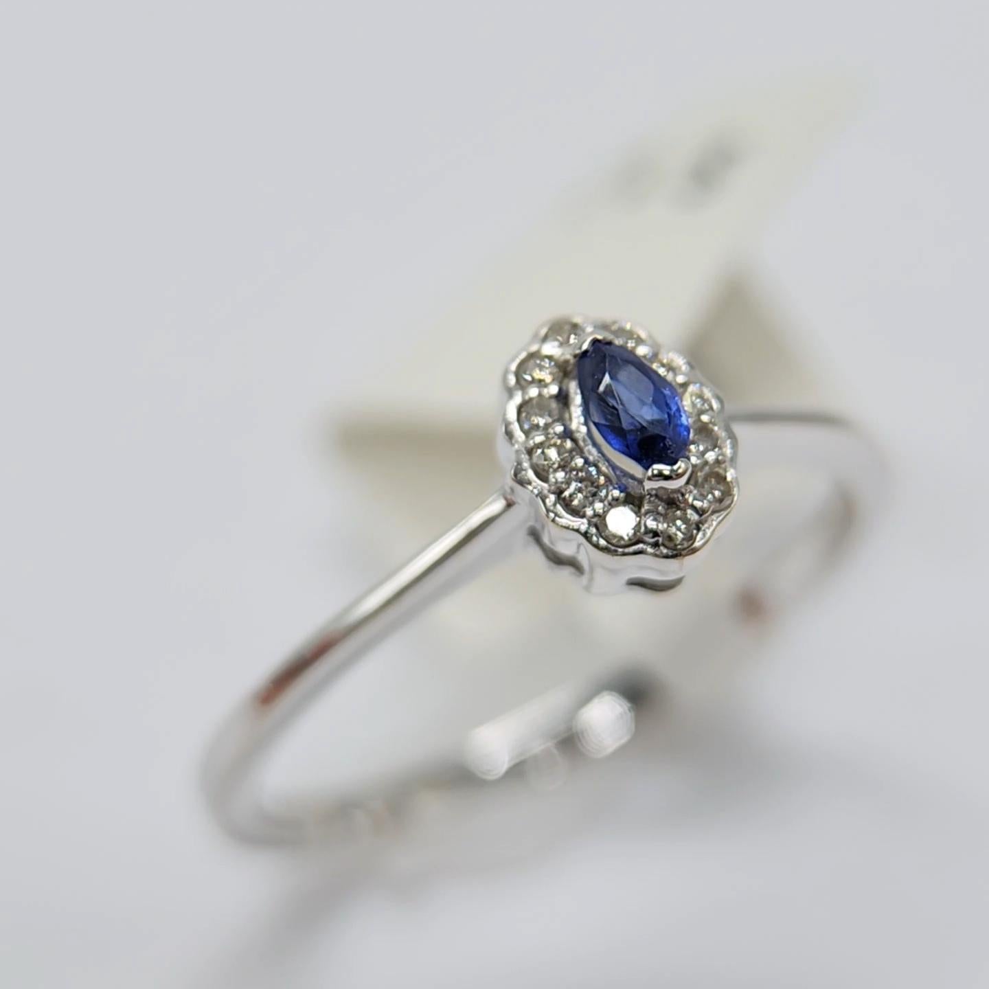 Marquise Cut Blue Sapphire  Ring 14 Karat White Gold with Diamonds. For Sale