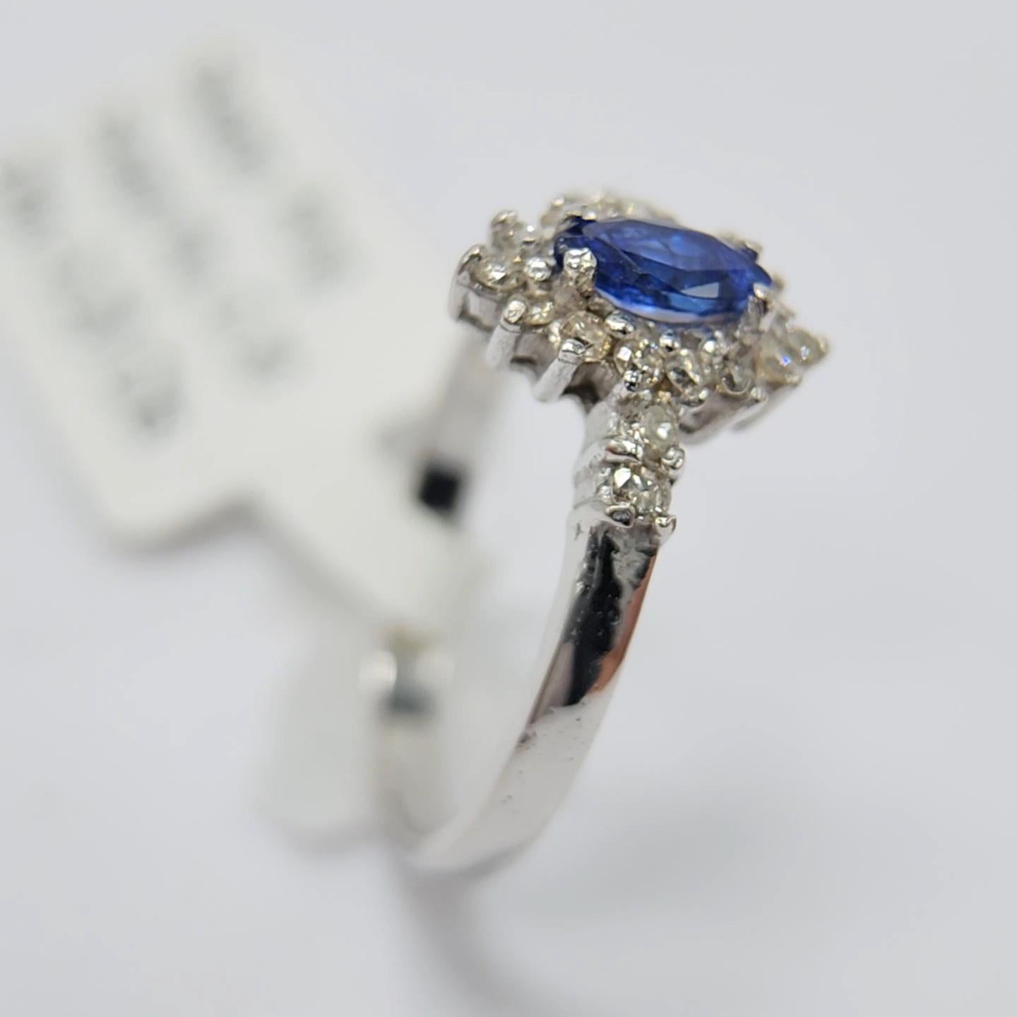 Marquise Cut Blue Sapphire  Ring 14 Karat White Gold with Diamonds. For Sale