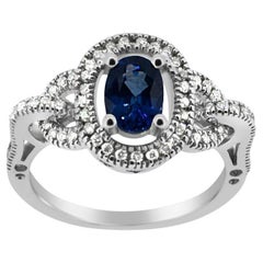 Blue Sapphire  Ring 14 Karat White Gold with Diamonds.