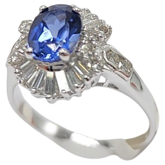 Oval Shape Sapphire  AAA brilliant deep Blue color 1.00 carat.
Total diamonds 0.75 carat G H - VVS
14k White Gold 3.50 Grams, 
Finger Size 7.5
All stones are natural .