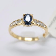 Blue Sapphire  Ring 14 Karat Yellow Gold with Diamonds.