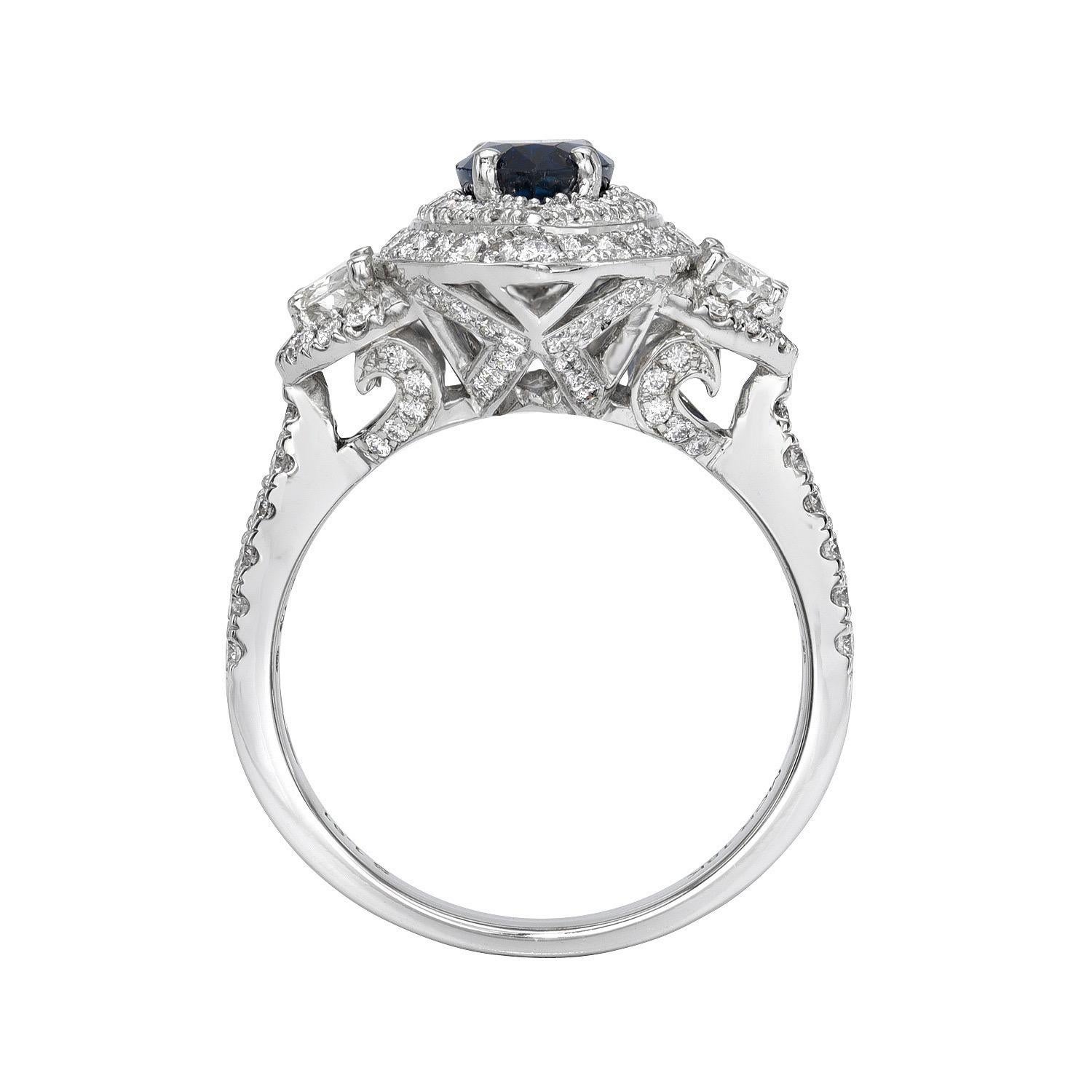 Splendid 1.81 carat Blue Sapphire marquise, 18K white gold ring, decorated with round brilliant diamonds totaling 0.89 carats and a pair of 0.31 carat half moon diamonds.
Ring size 6.5. Resizing is complementary upon request.
Returns are accepted