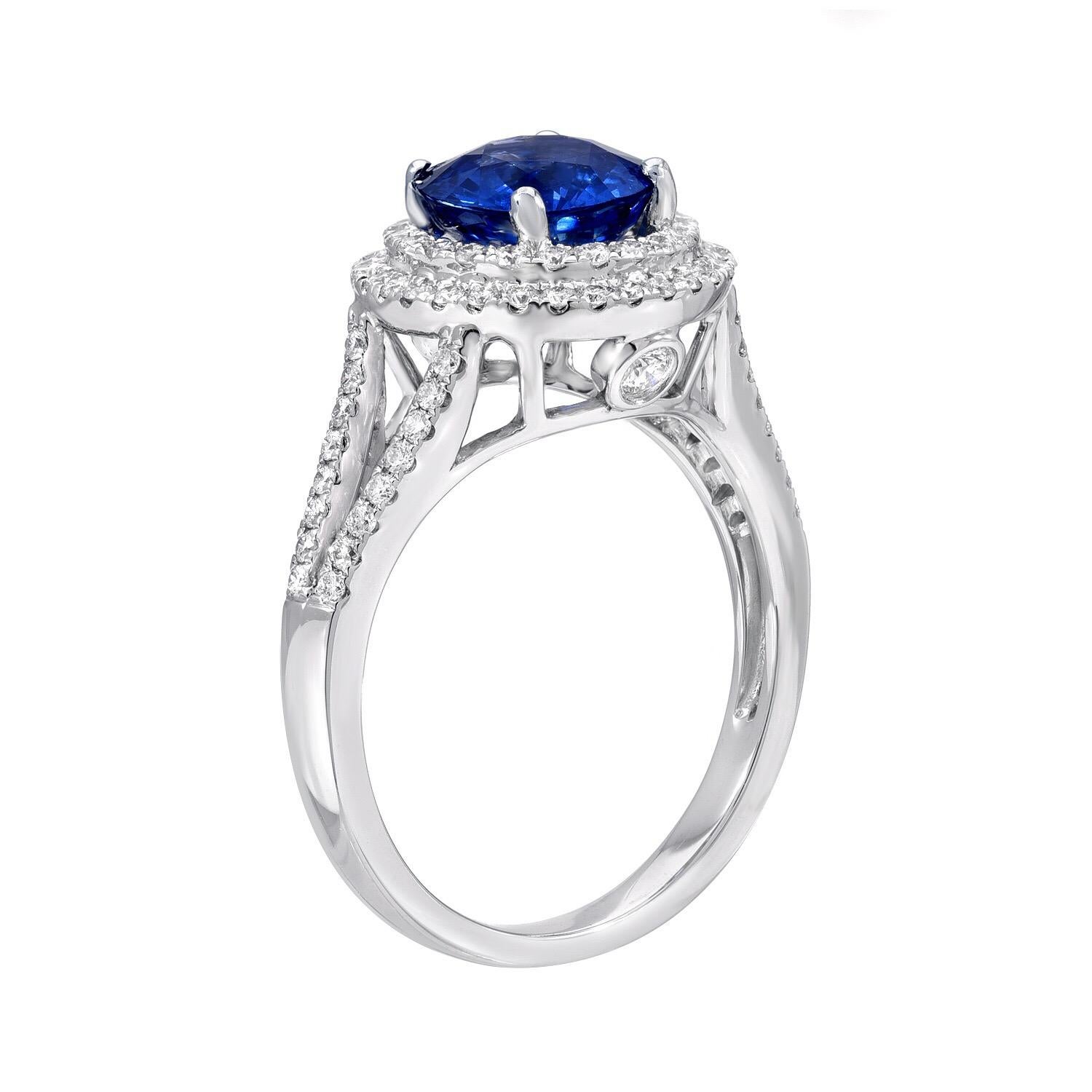 Sapphire ring showcasing a round Blue Sapphire, weighing a total of 2.12 carats, hand set in 18K white gold, and adorned by a total of 0.59 carat diamonds.
Size 6.5. Re-sizing is complimentary upon request.
Returns are accepted and paid by us within