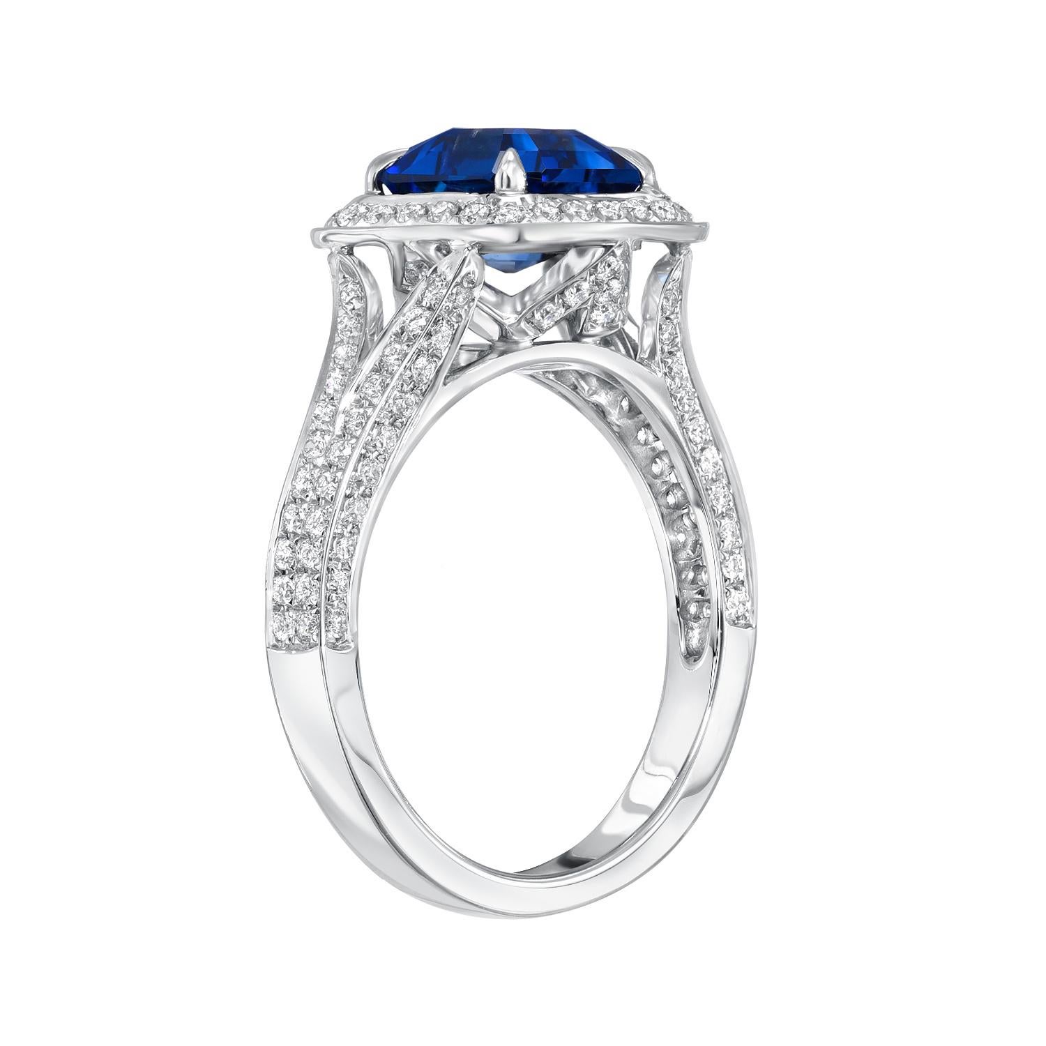 2.58 carat Royal Blue Sapphire square emerald-cut, 18K white gold ring, surrounded by round brilliant diamonds weighing a total of 0.57 carats. 
Ring size 6.5 Resizing is complementary upon request.
Crafted by extremely skilled hands in the