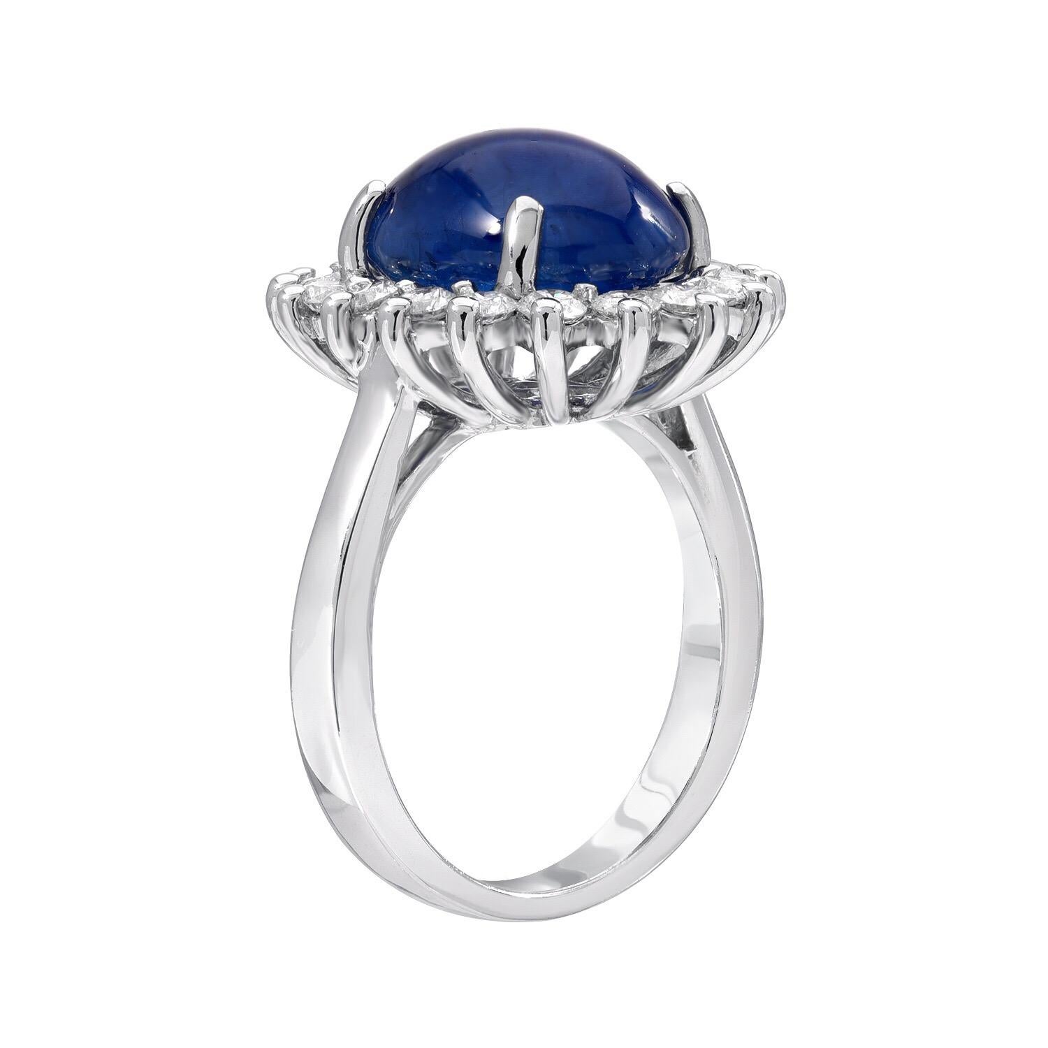 Sapphire ring featuring a blue Sapphire oval Cabochon, weighing a total of 8.97 carats, surrounded by a total of 1.04 carats of round brilliant diamonds, in 18K white gold.
Size 6.75. Re-sizing is complimentary upon request.
Returns are accepted and