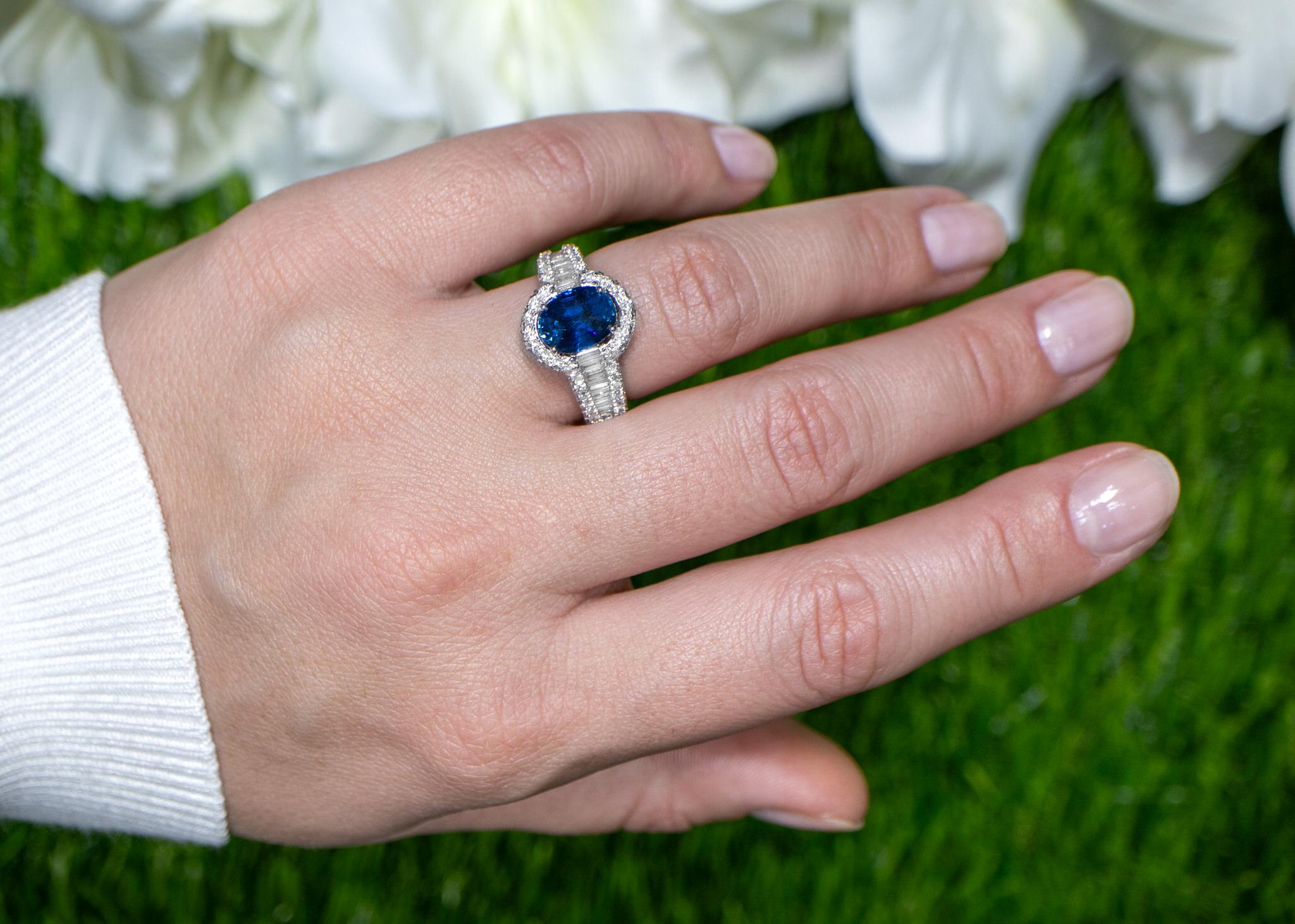 Oval Cut Blue Sapphire Ring Diamond Setting 4.67 Carats 18K Gold For Sale