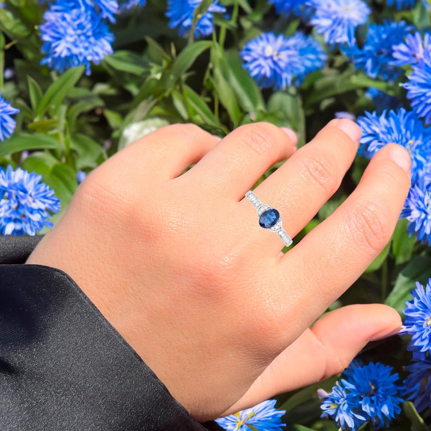 It comes with the Gemological Appraisal by GIA GG/AJP
All gemstones are natural
Blue Sapphire = 0.94 Carats
16 Diamonds = 0.10 Carats
Metal: 10K White Gold
Ring Size: 7* US
*It can be resized complimentary