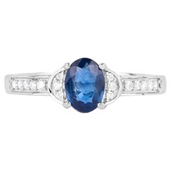 Anello con zaffiro blu e diamanti 1,04 carati in oro bianco 10K
