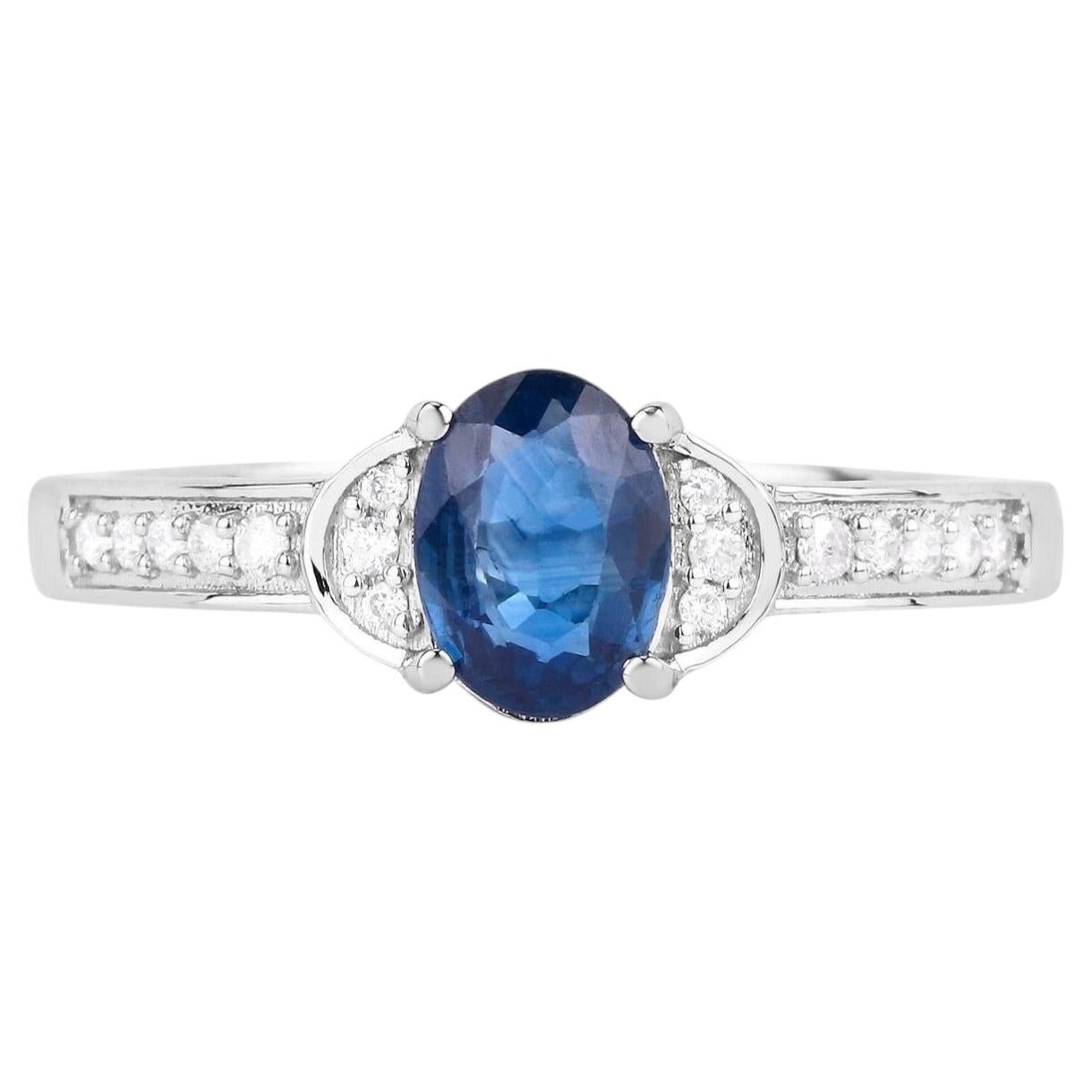 Bague en or blanc 10 carats, diamants et saphir bleu 1,04 carat