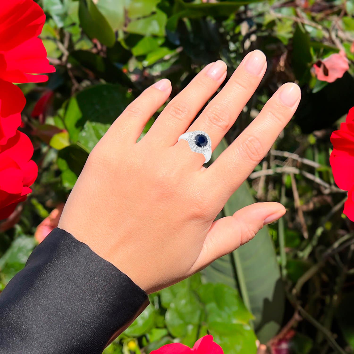 It comes with the Gemological Appraisal by GIA GG/AJP
All gemstones are natural
Blue Sapphire = 1.48 Carats
32 Diamonds = 0.22 Carats
Metal: 10K White Gold
Ring Size: 7* US
*It can be resized complimentary