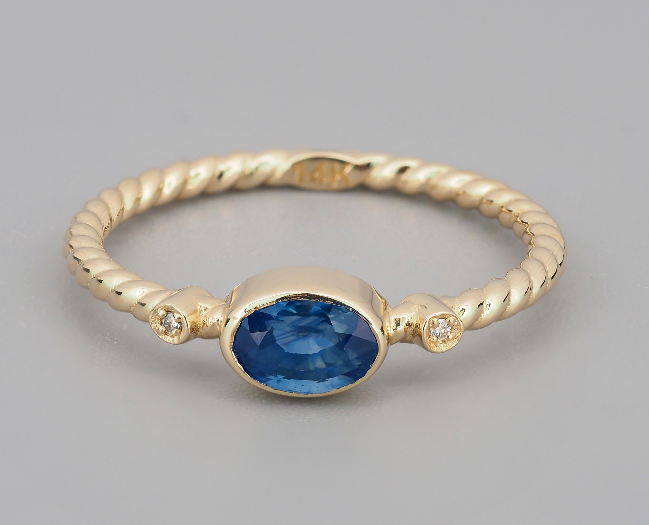 Modern Blue sapphire ring in 14k gold.  For Sale
