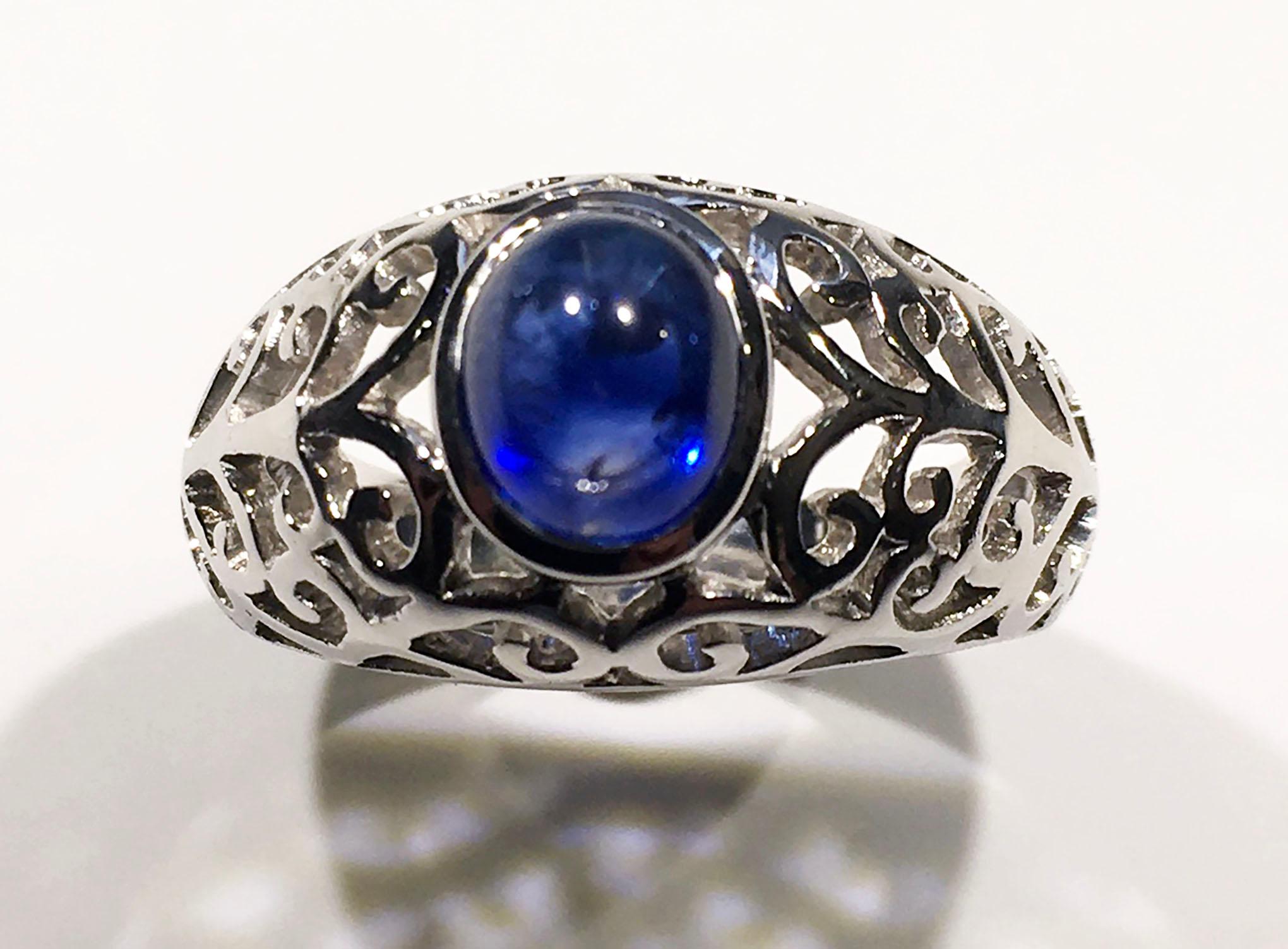 Artist Blue Sapphire Ring in 14kt White Gold For Sale