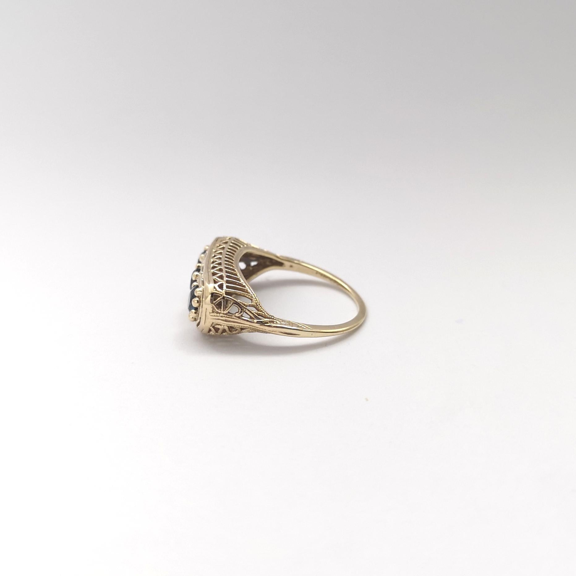 Bague en saphir bleu sertie d'or 14 carats en vente 5