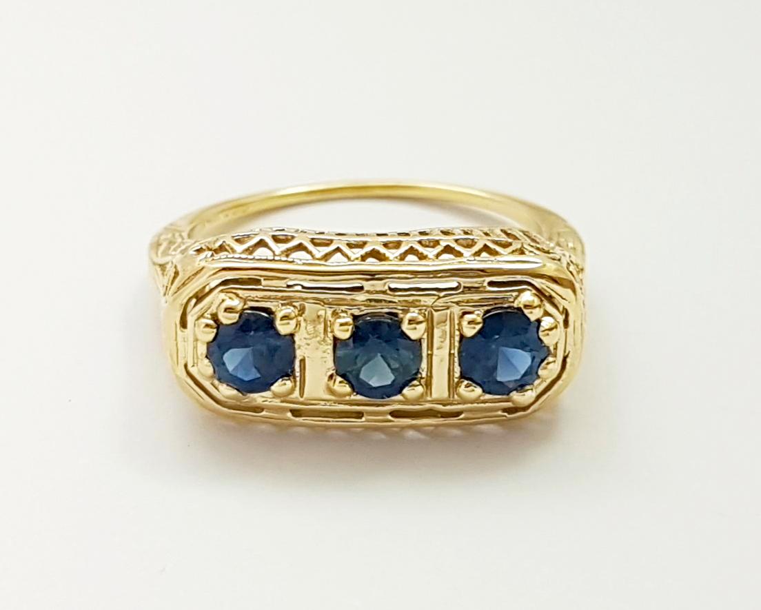 Bague en saphir bleu sertie d'or 14 carats en vente 6