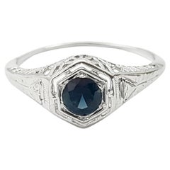 Anello con zaffiro blu incastonato in oro bianco 14K