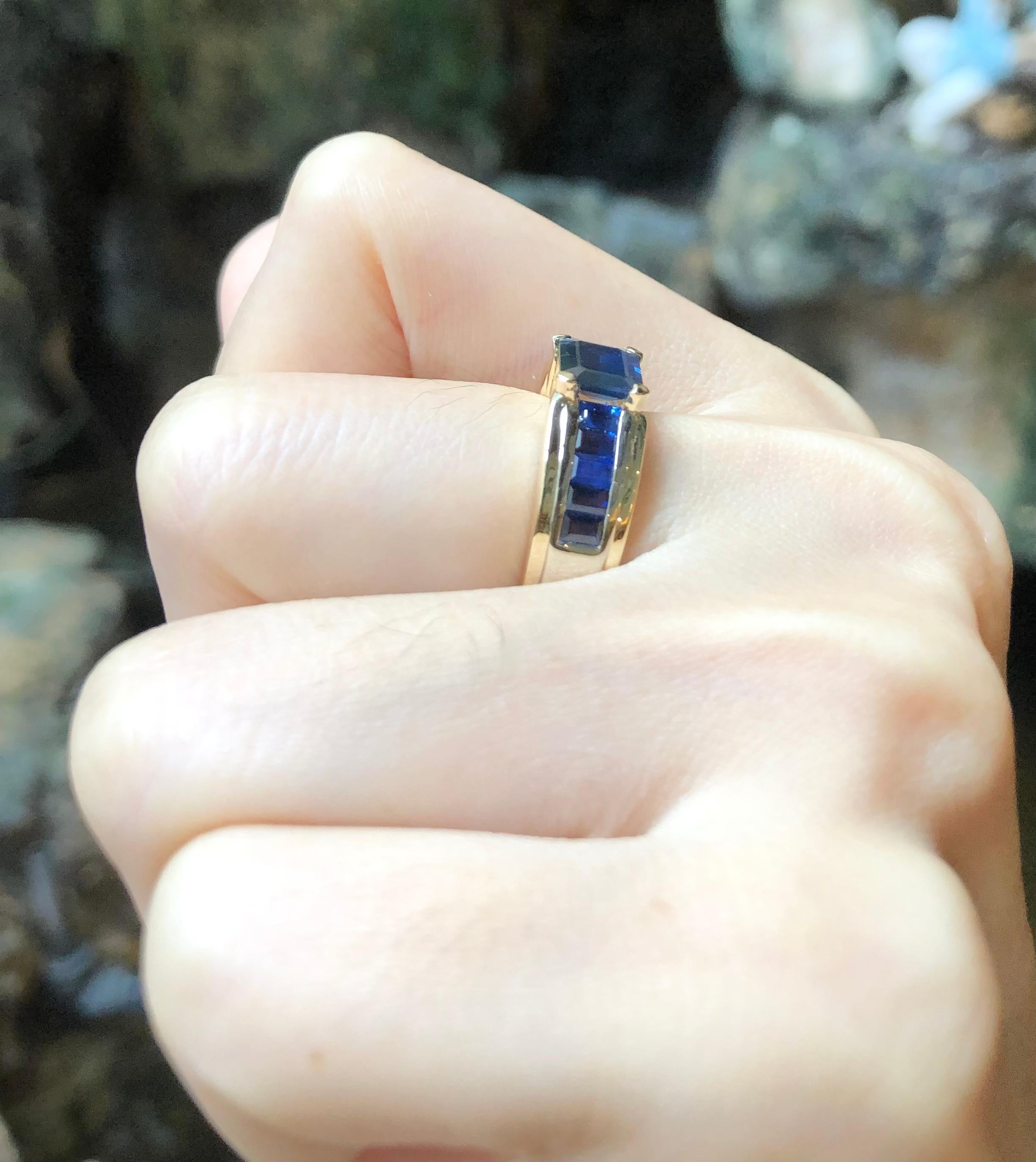 Contemporary Blue Sapphire Ring Set in 18 Karat Gold Settings