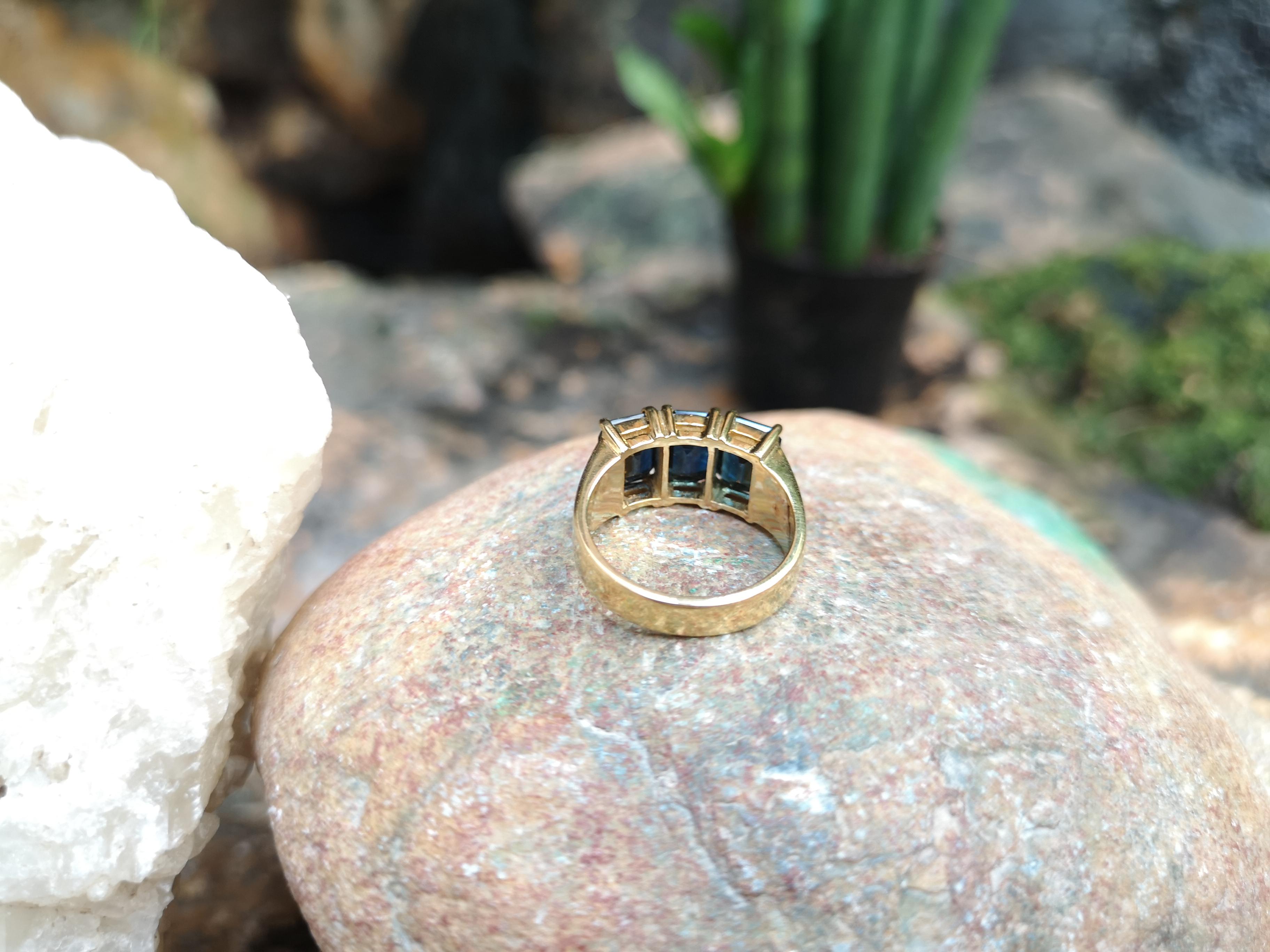 Emerald Cut Blue Sapphire Ring Set in 18 Karat Gold Settings For Sale