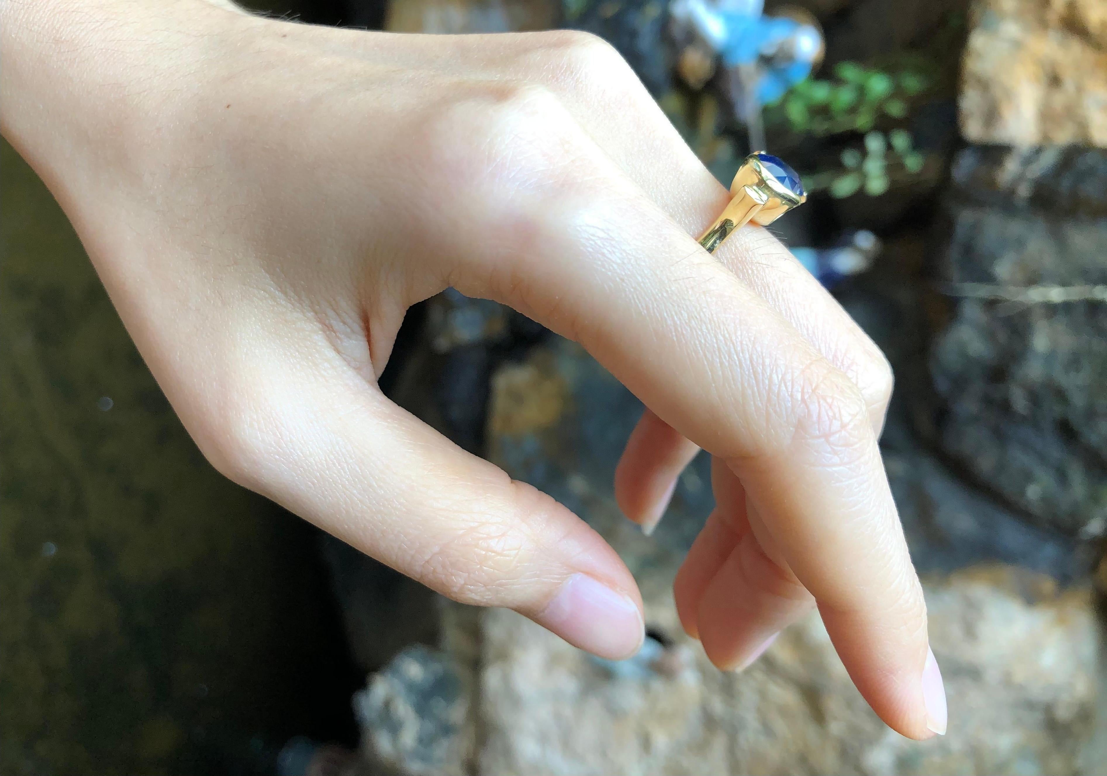 Oval Cut Blue Sapphire Ring Set in 18 Karat Gold Settings For Sale