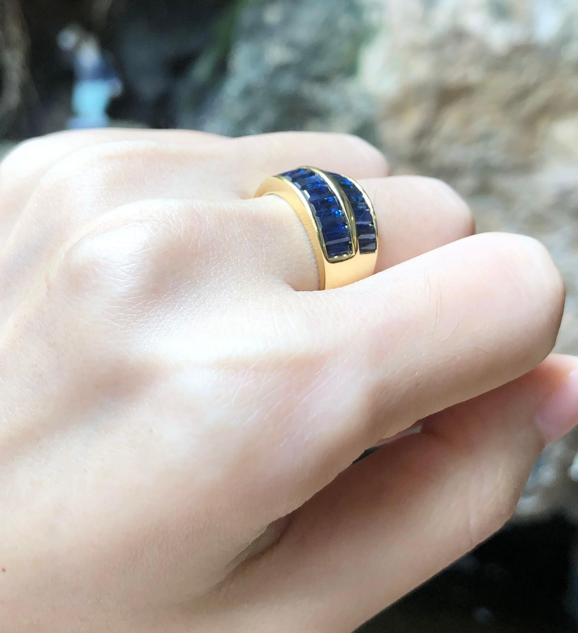 Baguette Cut Blue Sapphire Ring Set in 18 Karat Gold Settings For Sale