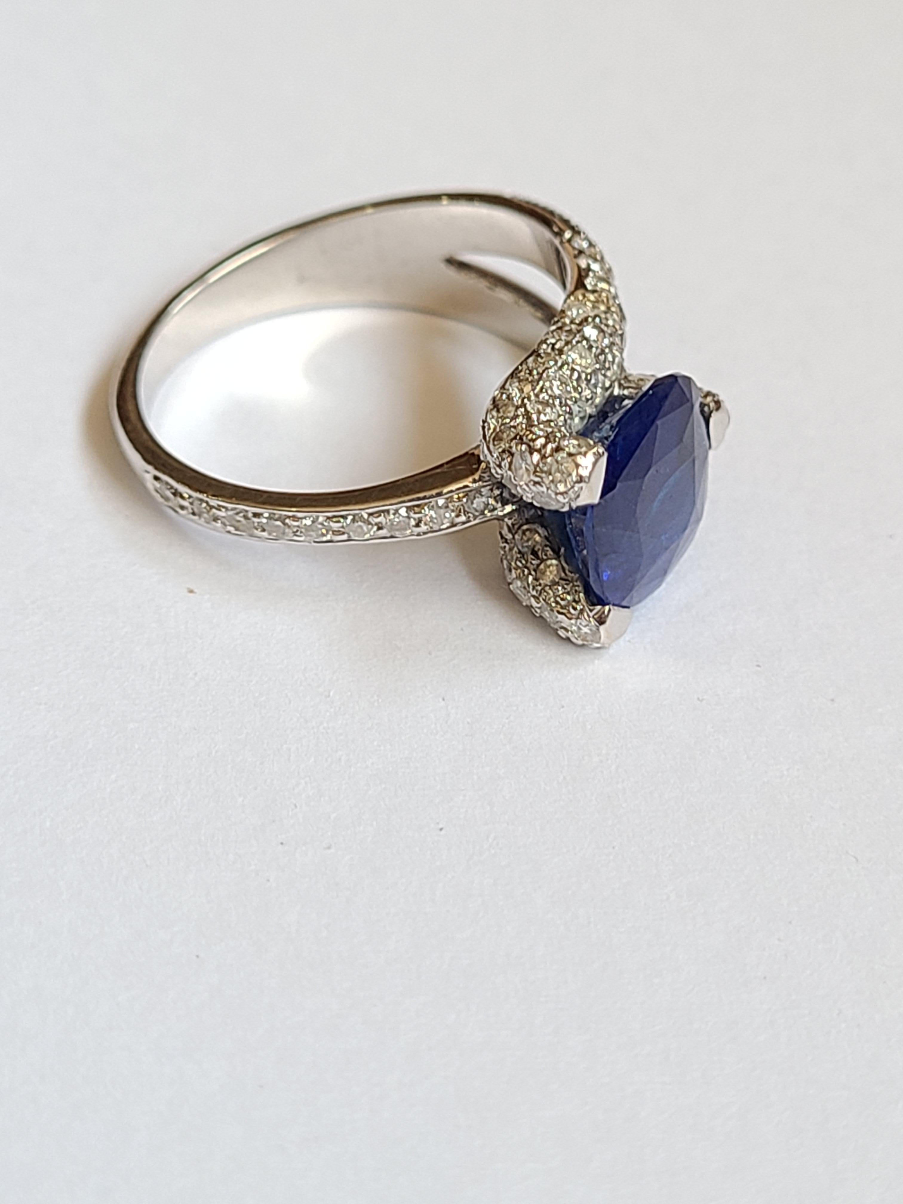 Blue Sapphire Ring Set in 18 Karat Gold with Diamonds 1